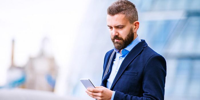 hipster-manager-with-smart-phone-london-city-hall-PBBAF8T-1024x681